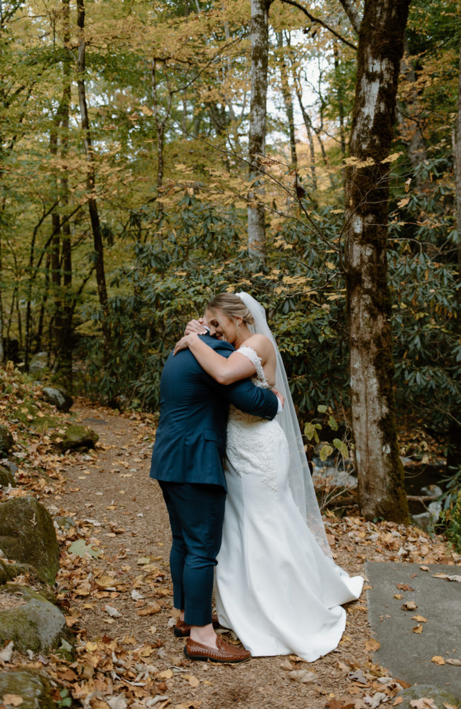 Bride and groom portraits taken at Smoky Mountain elopement venue, Ely's Mill.