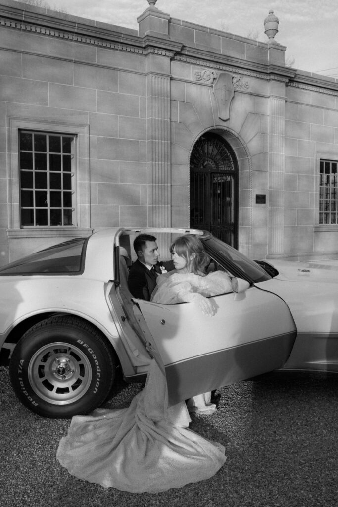 Classic car staged in front of micro wedding venue in Tennessee as bride and groom prepare for their grand exit.