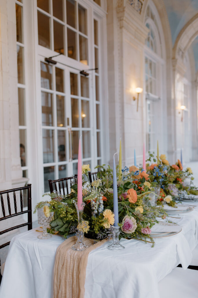 Colorful Spring tablescape in reception space at Nashville Wedding Venue.