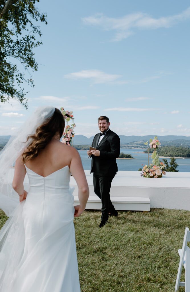 Bride and groom first look at summer wedding in Tennessee.