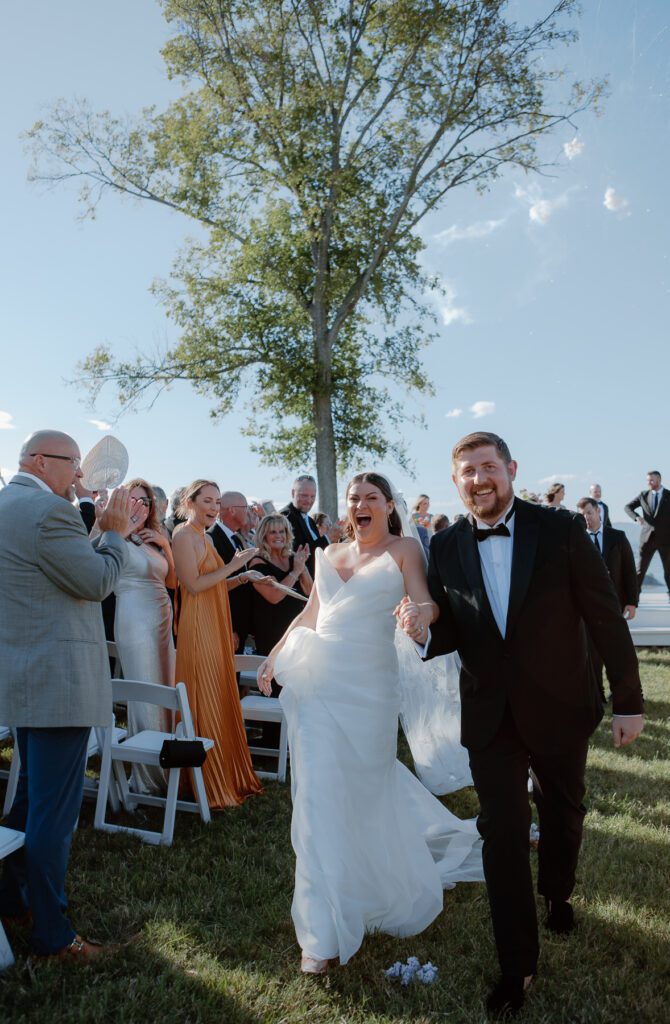 Fun colorful backyard wedding exit with firework display.