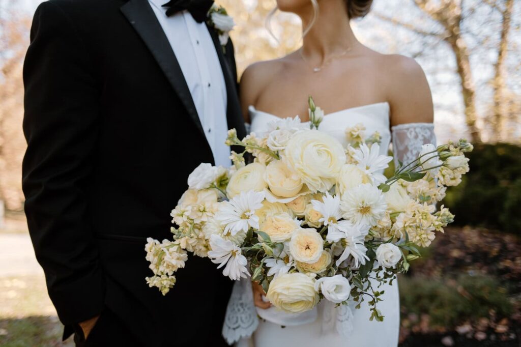 Colorful wedding bouquet with soft whites and buttery yellows for a September wedding at Whitestone Inn, an east Tennessee wedding venue.