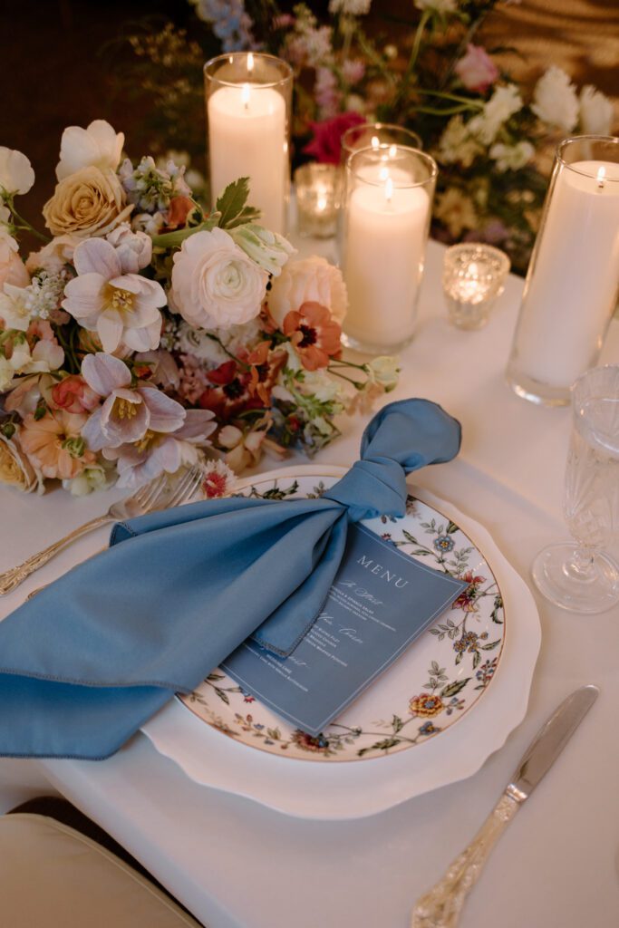 Candlelit tablescape at CJ's Off the Square wedding reception. This is a Nashville wedding venue.