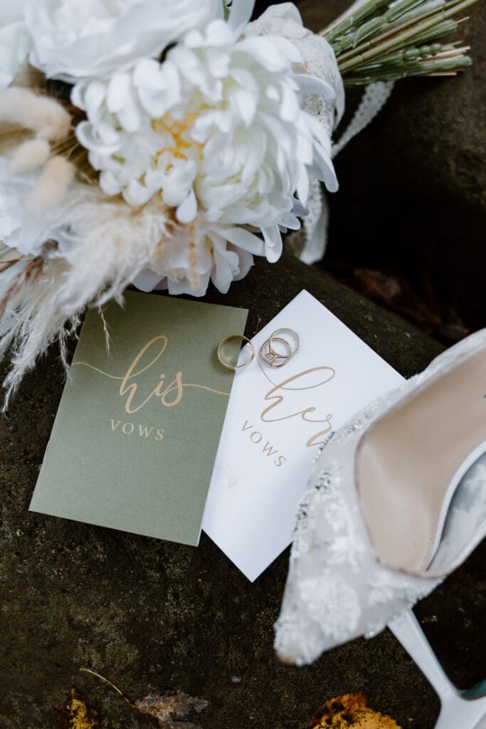Sage green vow books for fall elopement inspiration.