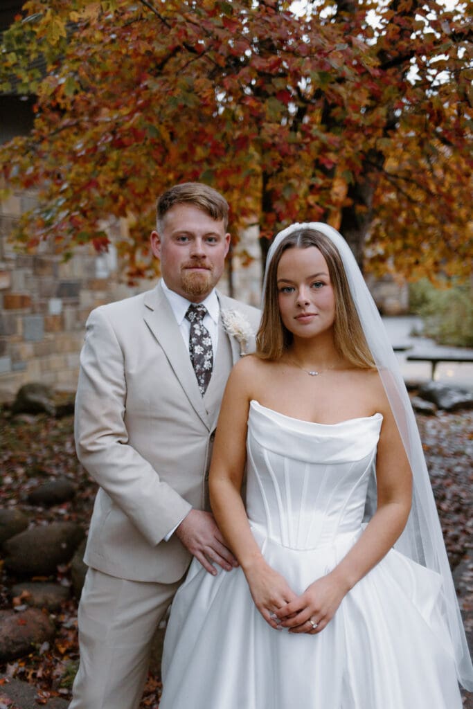 Bride and groom attire for fall elopement inspiration at Cataract Falls in Tennessee.