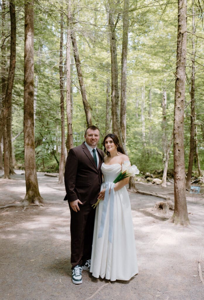 Bride and groom wedding portraits at Cataract Falls, Tennessee during a summer elopement in the Smokies.