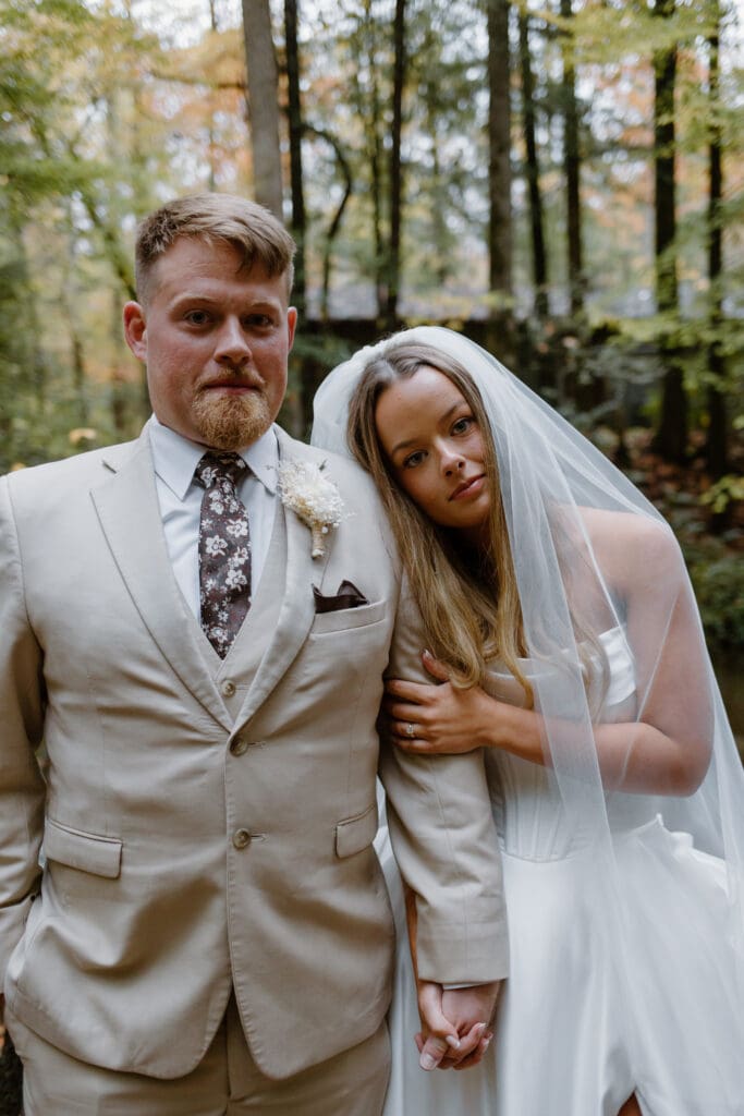 Bride and groom portraits in the Smoky Mountain National park. This blog features fall elopement inspiration for brides getting married in Tennessee.