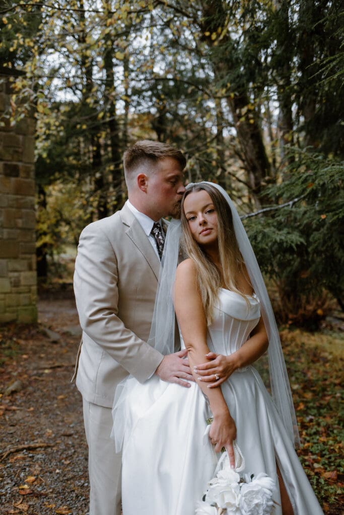 Bride and groom posing ideas for fall elopement inspiration.