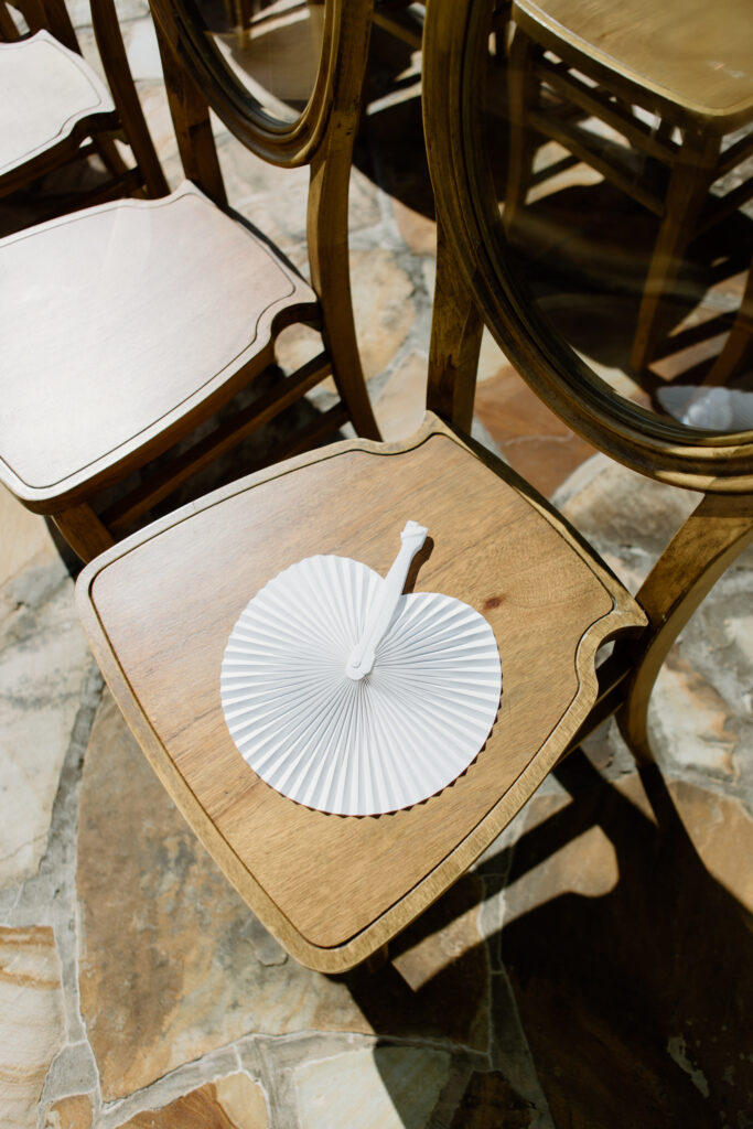 Hand held fans are an essential for wedding guests during your summer garden wedding.