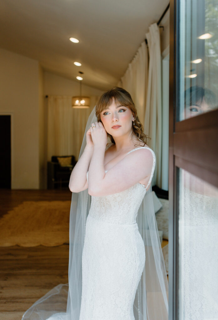 Bride getting ready for her wedding at Nichols Heir Summer Garden Wedding in Sevierville, TN