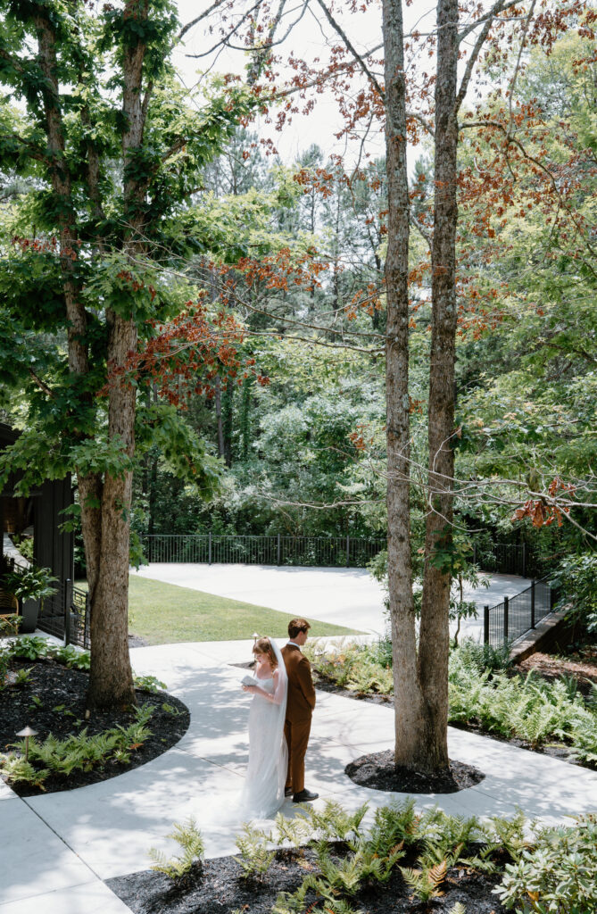 First touch at Nichols Heir Summer Garden Wedding in Sevierville, TN