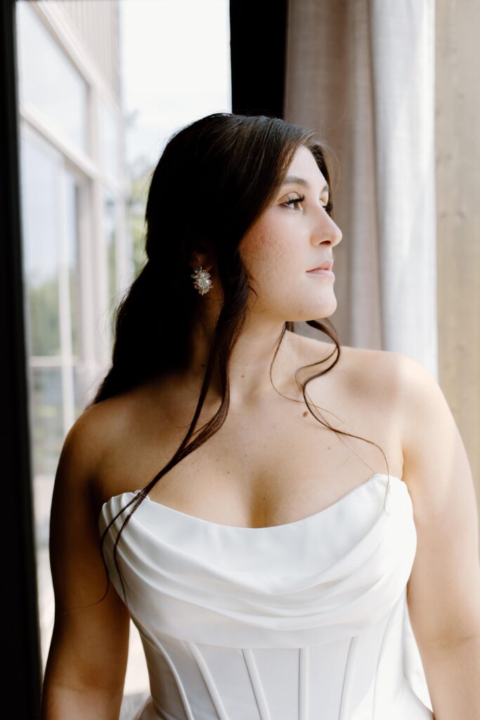 Bride getting ready in Tennessee for her summer elopement in the Smokies. Captured by Tennessee elopement photographer.