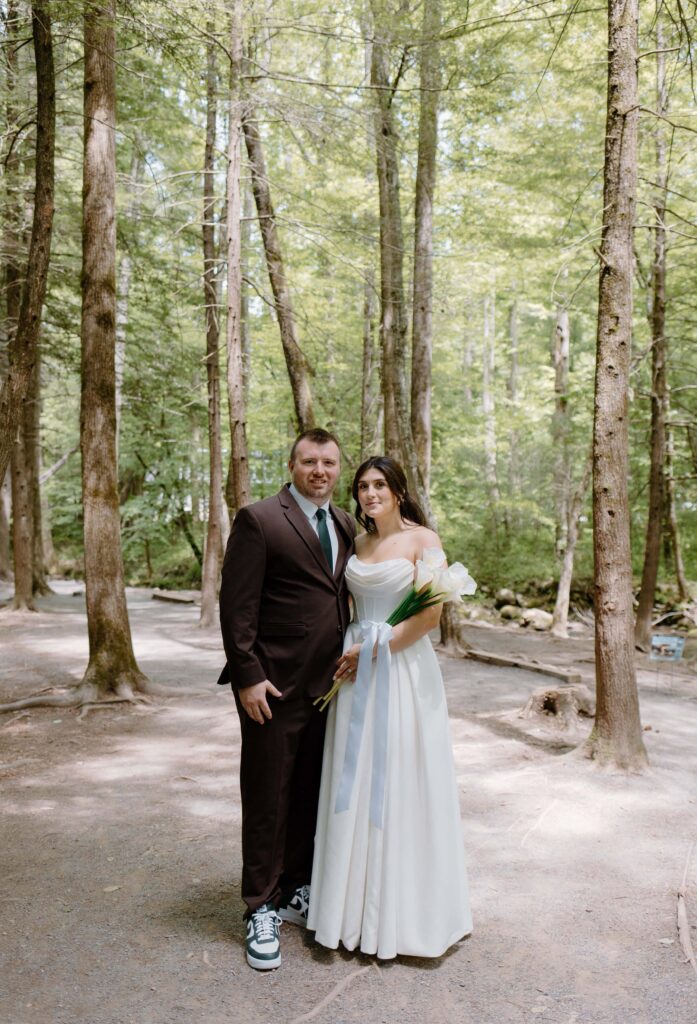 Bride and groom wedding portraits at Cataract Falls, Tennessee during a summer elopement in the Smokies. Captured by elopement photographer in Tennessee.