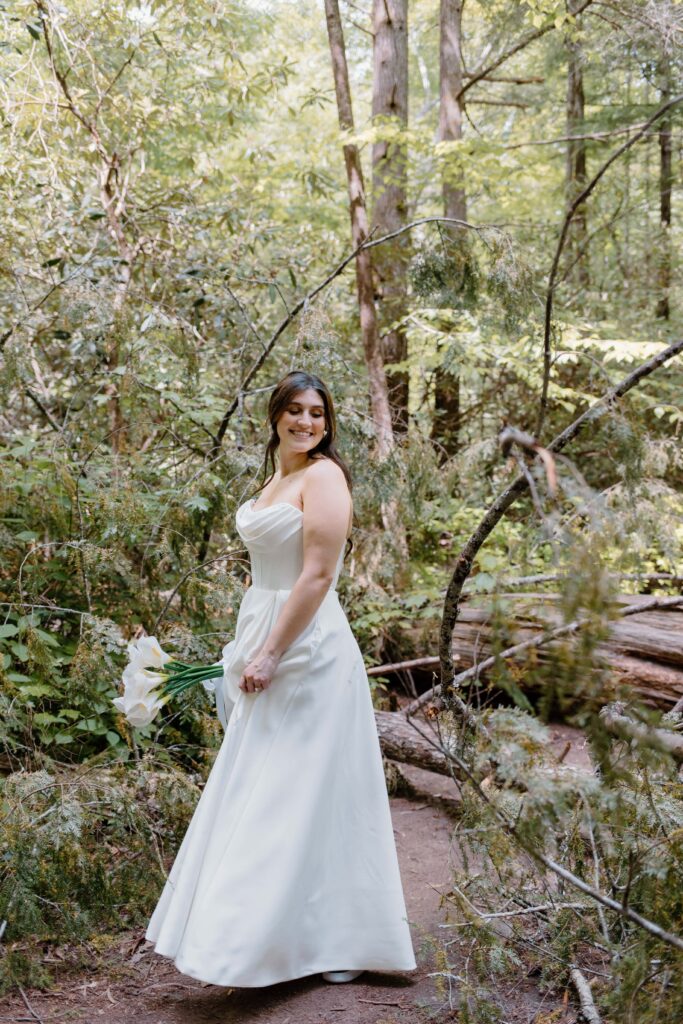 Bride poses for her bridal portraits during her elopement. Captured by elopement photographer in Tennessee.
