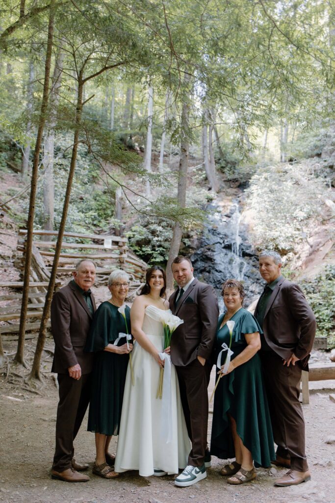 Family portraits at Cataract Falls during a summer elopement. Captured by Tennessee Elopement Photographer.