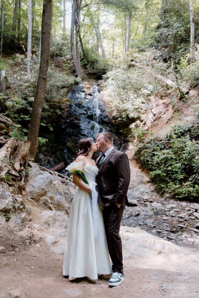 Bride and groom portraits at Cataract falls for their summer elopement in the Smokies. Captured by Tennessee elopement photographer.