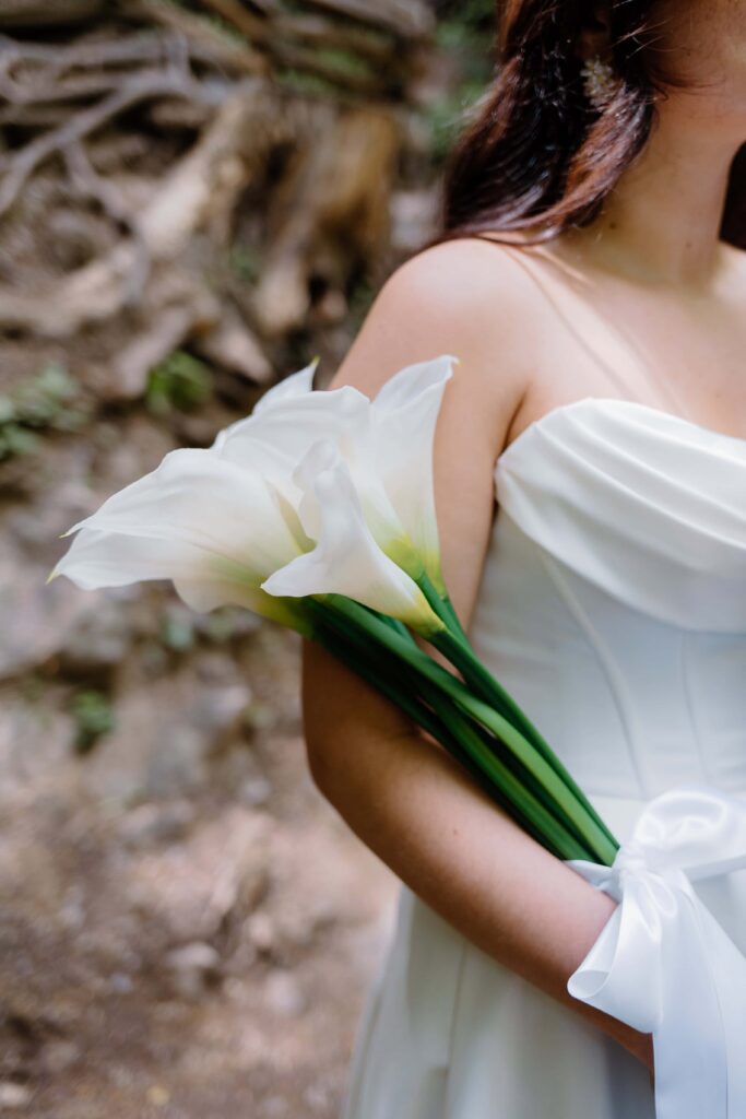 Minimalist lily bridal bouquet, perfect for a summer elopement in the Smokies.