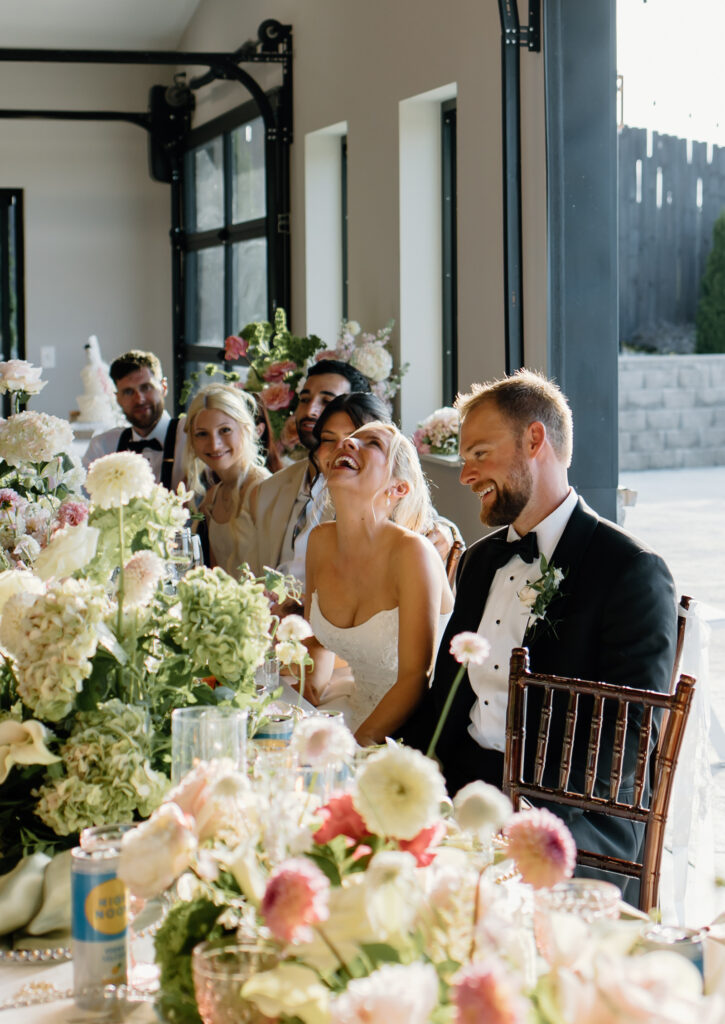 Candid reception moments of bride and groom at Tennessee wedding venue, The Loyston.