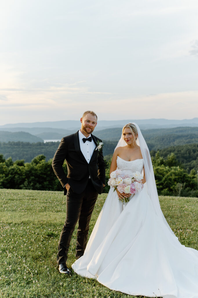 Sunset photos of bride and groom with mountain views at Tennessee wedding venue, The Loyston.