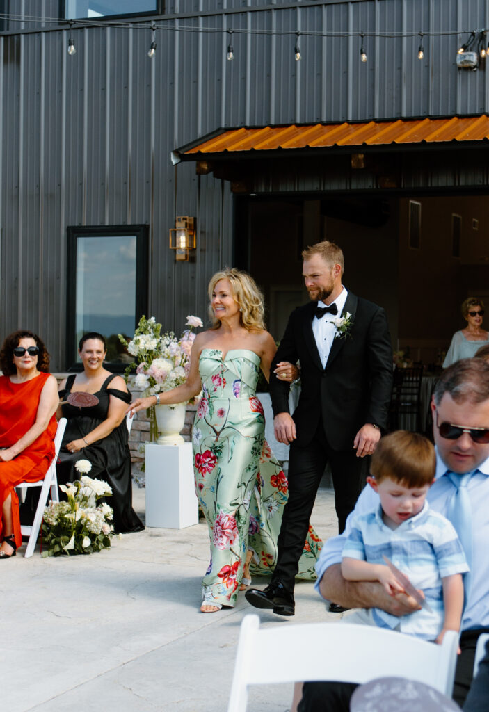 Groom walking down the aisle at the Loyston Wedding Venue.