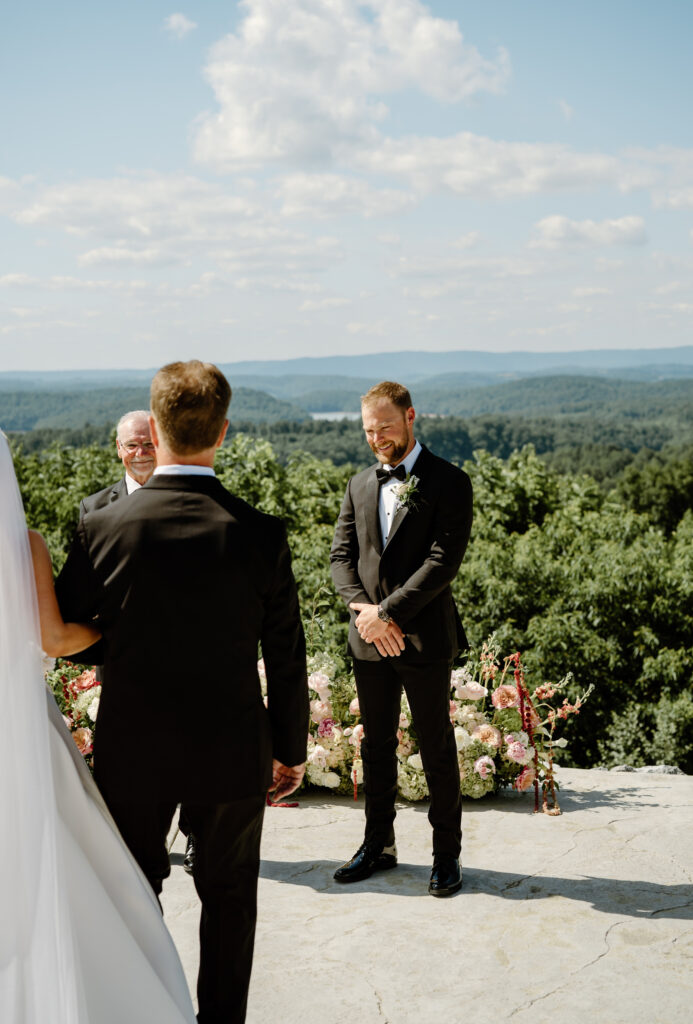 Groom sees the bride for the first time at the Loyston Wedding Venue.