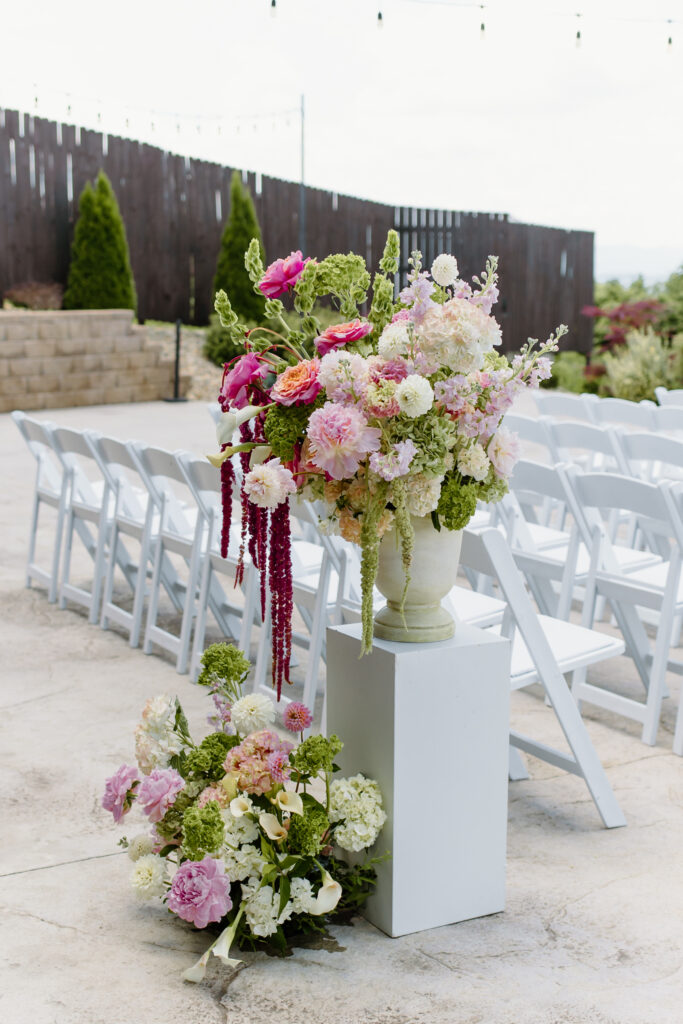 Ceremony floral arrangements at The Loyston Wedding venue.