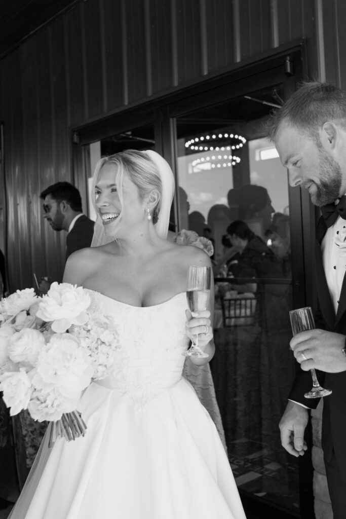 Candid moment of the bride and groom at The Loyston Wedding Venue.