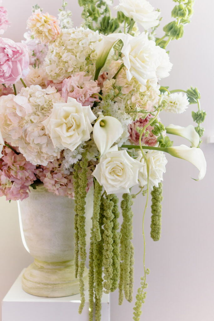 Romantic summer floral arrangement at The Loyston Wedding Venue.