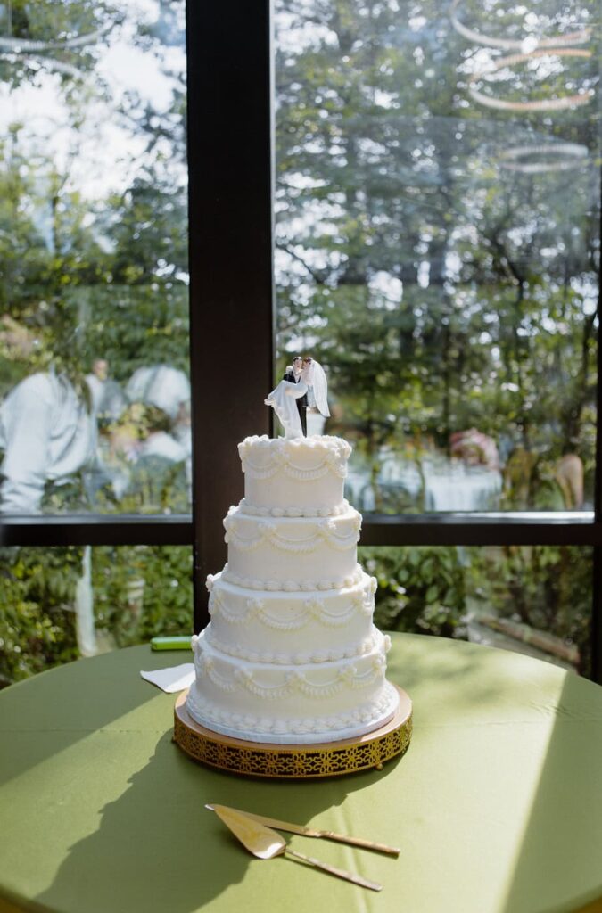 4 tiered wedding cake at Nichols Heir wedding venue, The Glass House.