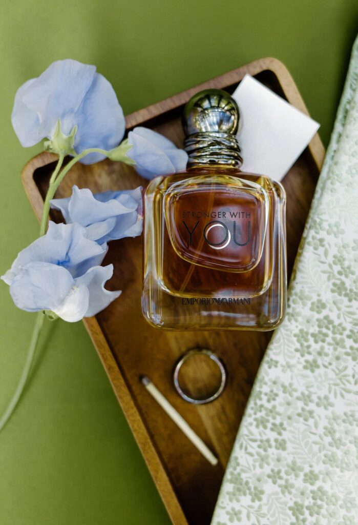 Simple wedding day flatlay capturing the groom's details.
