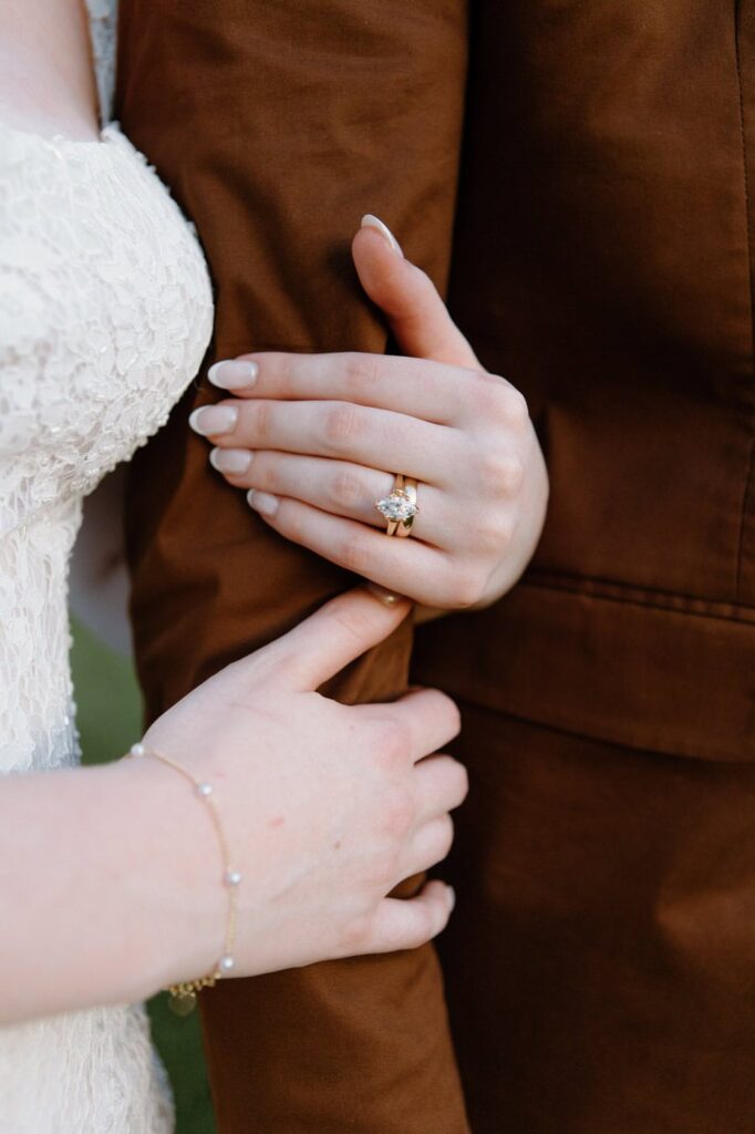 Bride gold wedding band detail shot.