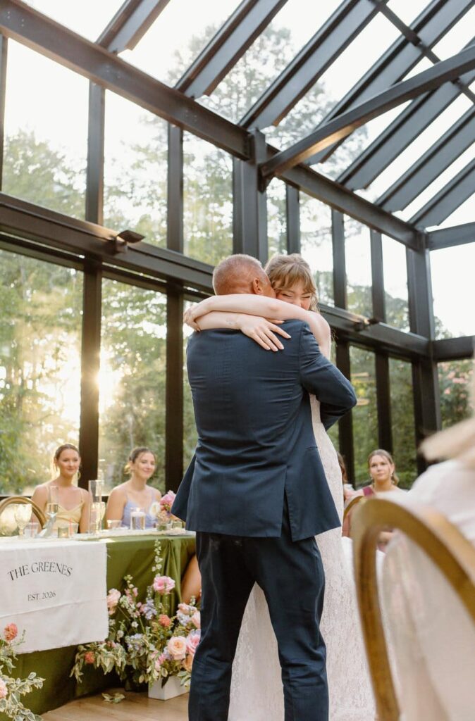 Bride hugs father as they share their father-daughter dance at Nichols Heir wedding venue in Tennessee.