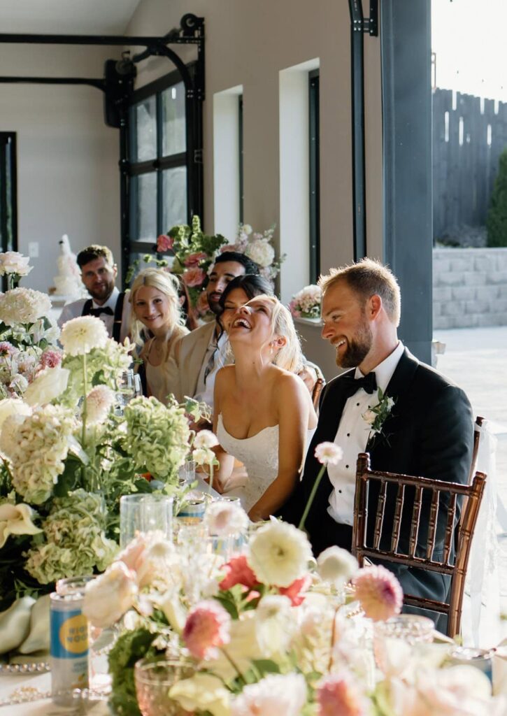 Candid reception moments of bride and groom at Tennessee wedding venue, The Loyston.