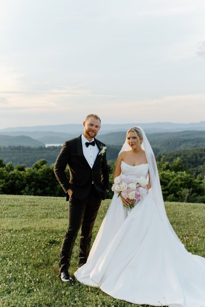Sunset photos of bride and groom with mountain views at Tennessee wedding venue, The Loyston.