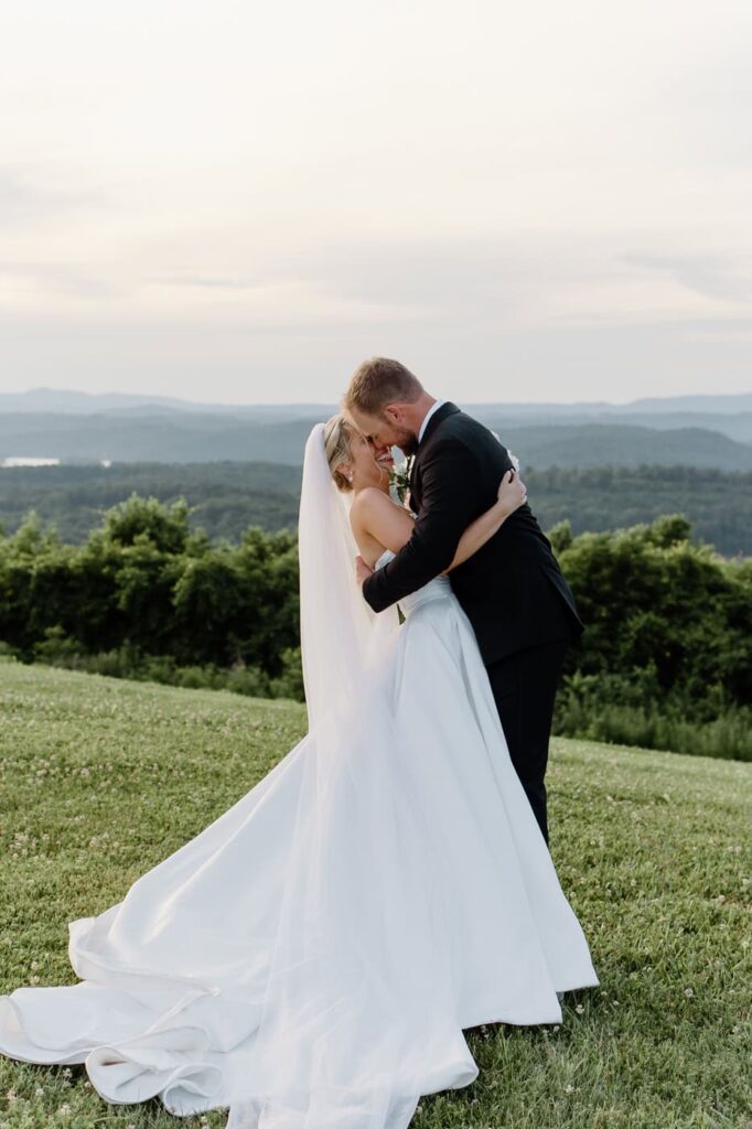 An in the moment capture of pure joy during sunset photos at The Loyston wedding venue in Tennessee.