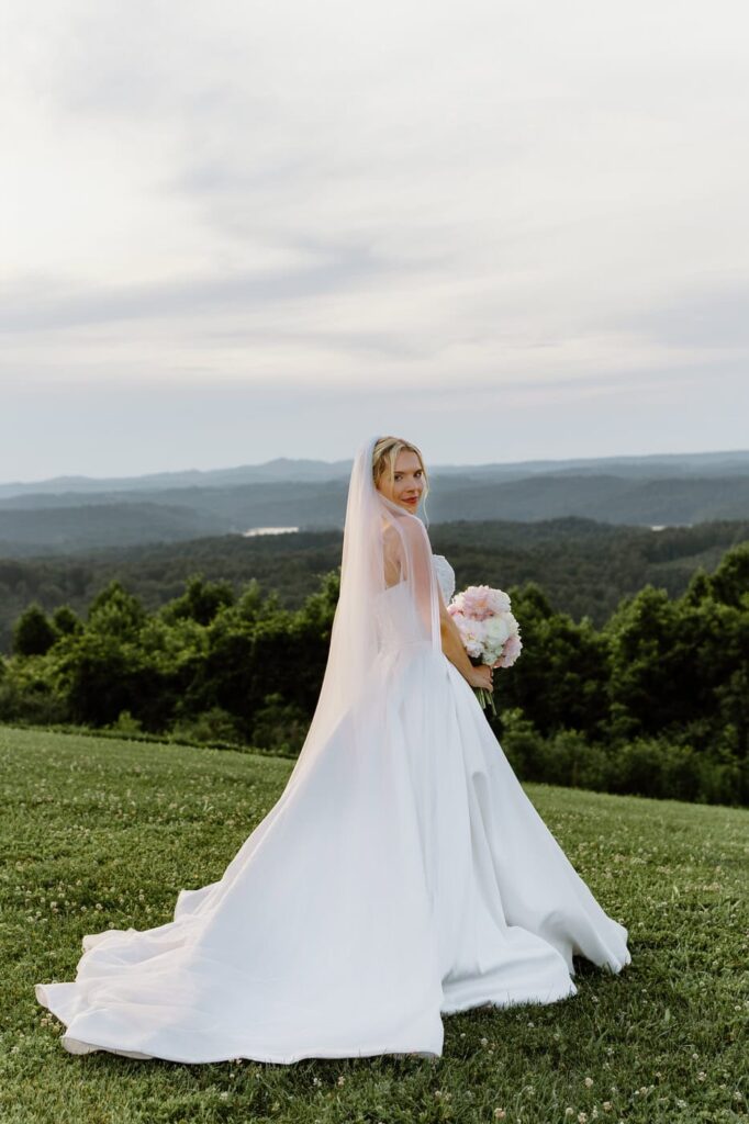 Bridal portraits with Tennessee hills in the background at The Loyston wedding venue in Tennessee.