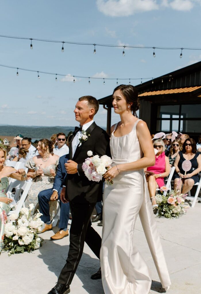 Bridal party walking down the aisle at the Loyston Wedding venue.