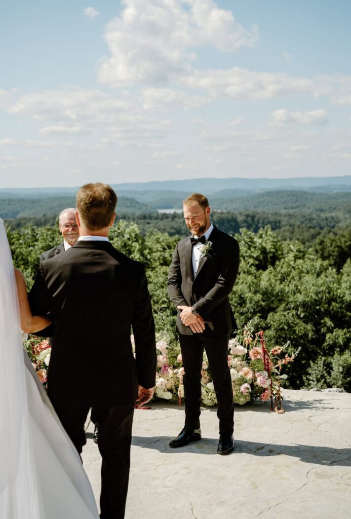 Groom sees the bride for the first time at the Loyston Wedding Venue.