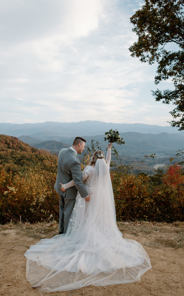 Who doesn't love a little booty grab to kick off your marriage? Nothing says, 'I love you,' like a romantic booty grab overlooking the Smoky Mountains.
