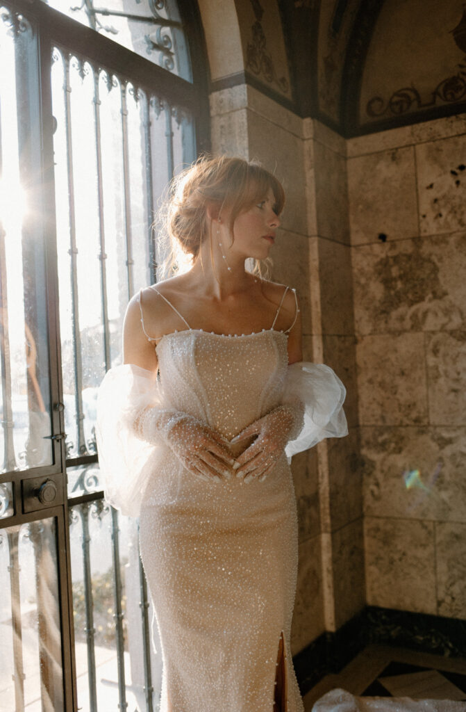 Elegant wedding dress for the modern and luxury bride with stunning pearl details.