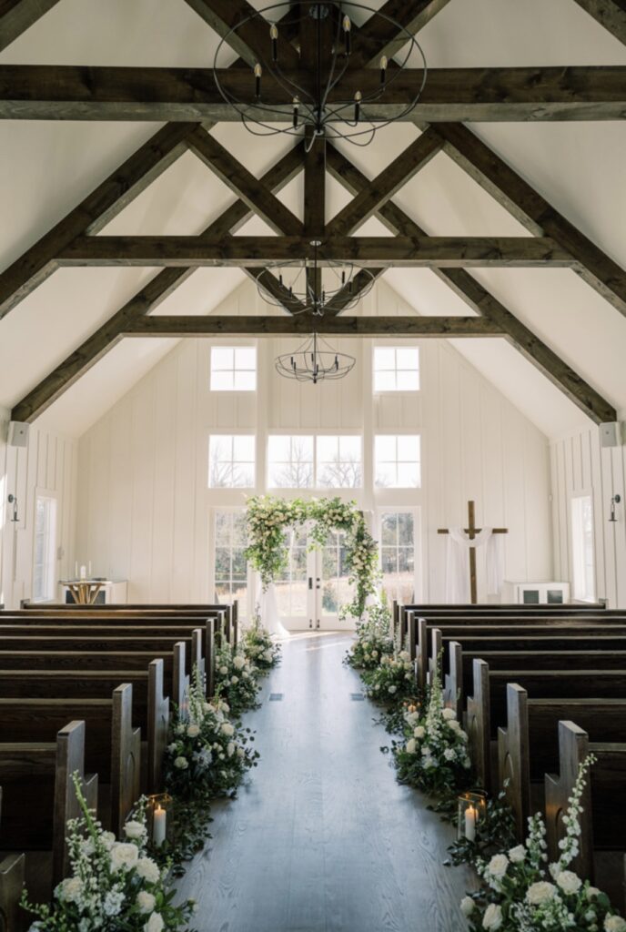 Indoor ceremony at a classic wedding chapel with modern touches. 