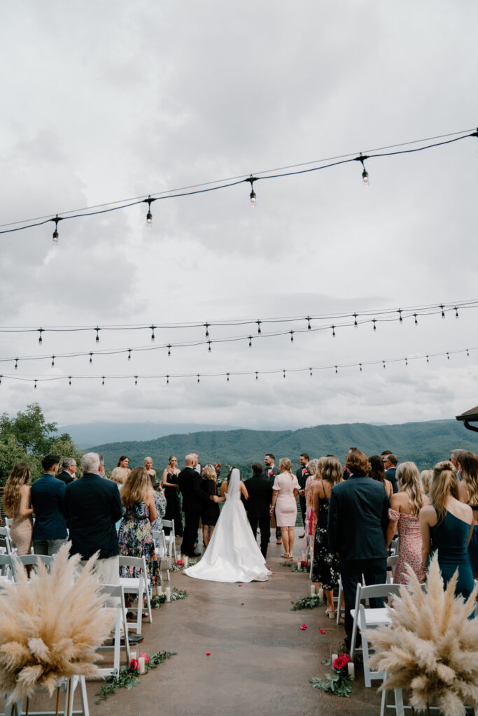 Wedding ceremony at The Magnolia Venue, a destination wedding venue overlooking The Smoky Mountains.