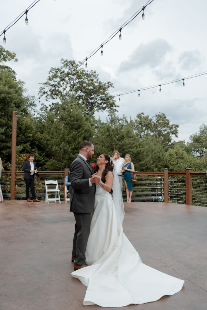 Bride and grooms first dance at Smoky Mountain wedding venue, The Magnolia Venue.