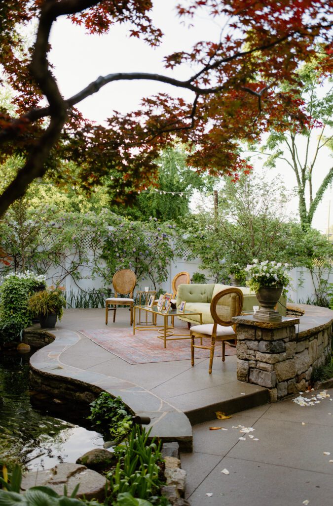 Garden seating at outdoor wedding reception at CJ's Off the Square, a Nashville wedding venue.